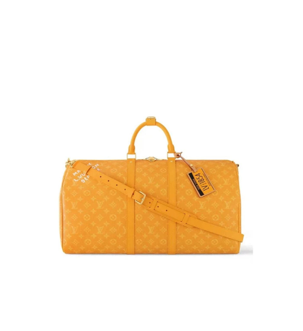Louis Vuitton hugs bag travel yellow logo