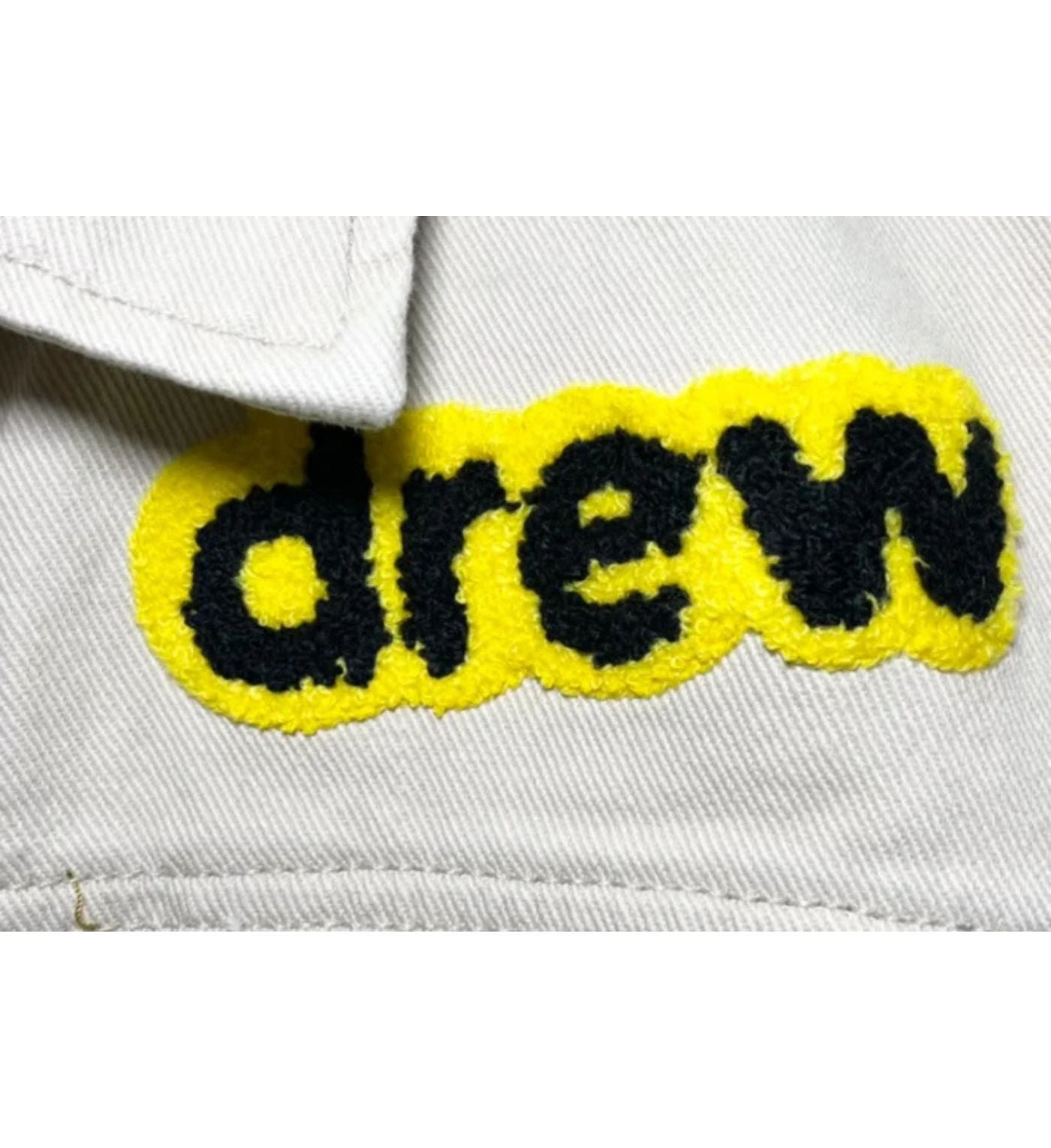 Drew house jacket Caki logo