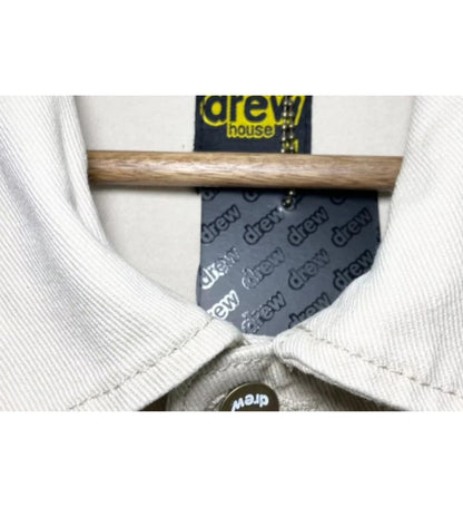 Drew house jacket Caki logo